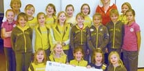 Brownies raise £220 for charity