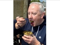 Mayor tucks into bush grub challenge