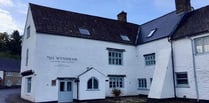 Villagers raise a glass to historic pub return