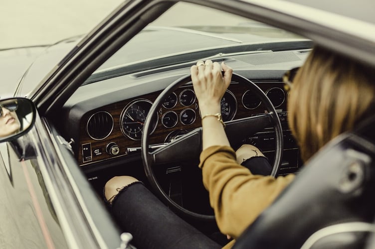 Stock image of someone driving a car 