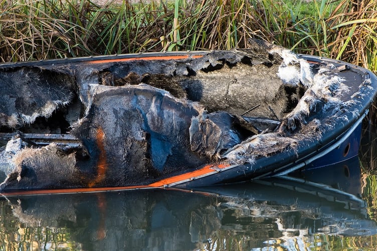 Boat damaged by fire