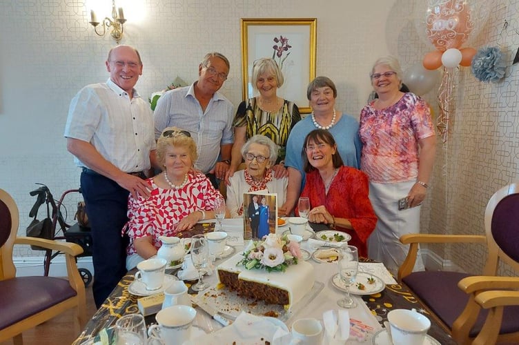 Jean Pain surrounded by loved ones and family