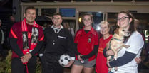 Walkers take on football-themed Moonlight Walk for Great Oaks Hospice