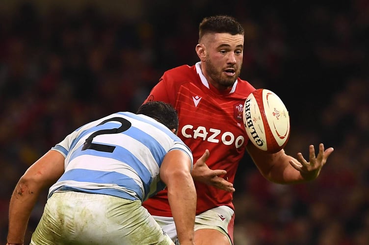 Gareth Thomas of Wales is tackled by Agustin Creevy of Argentina