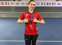 Double gold on GB debut for Isobel