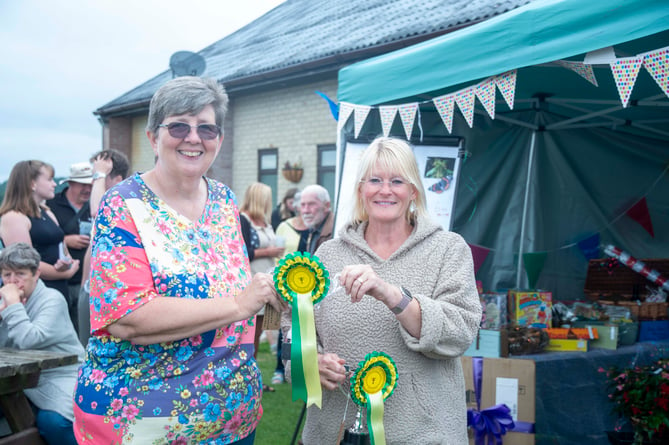 Trudi Breadman and Cheryl Hutchinson-Holford shared the Gerald Vaughan Cup for most points in potatoes, onions and beans with John Baker.