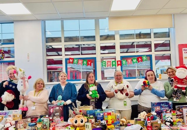 Staff and volunteers with some of the toys at the Gloucestershire retail event