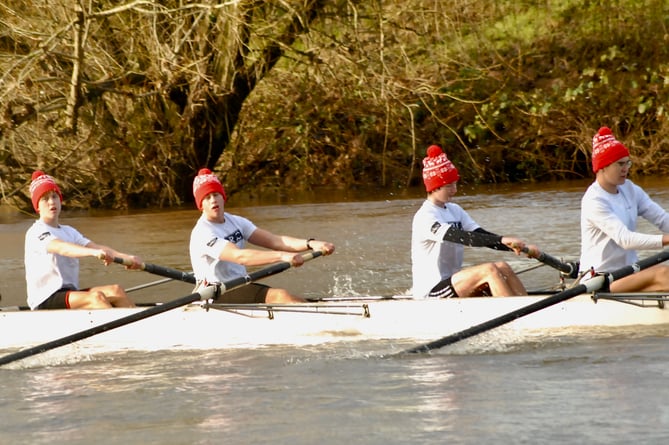 This Llandaff boat entered into the festive sprit by racing in Santa hats